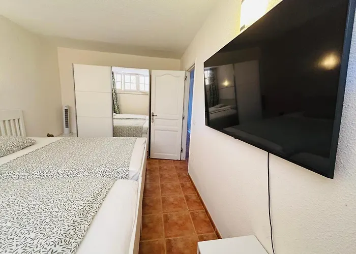 Neptuno Beachfront Retreat With Smart Tvs And Terrace